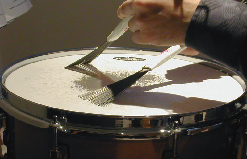 image of someone playing drums